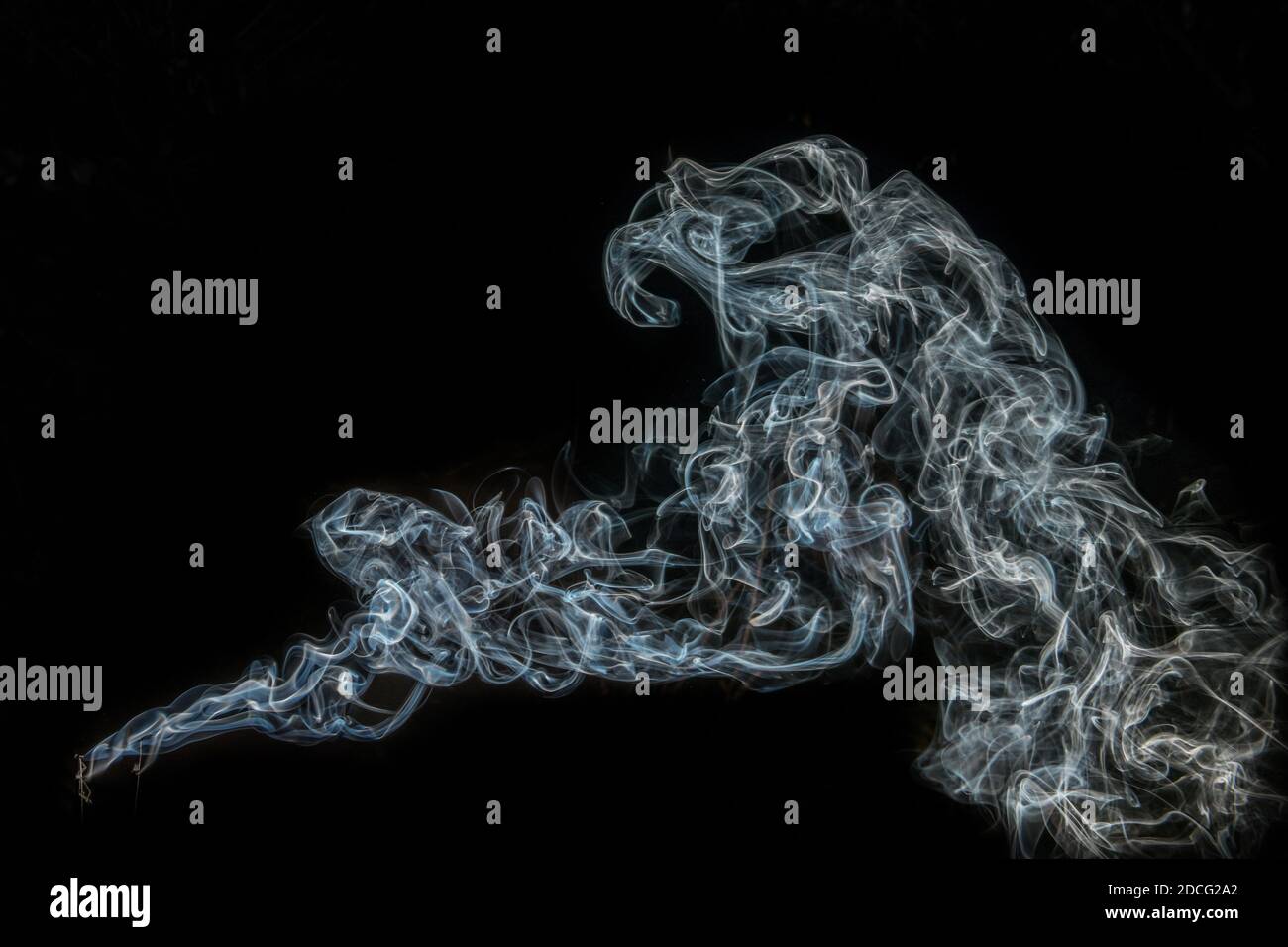blue Smoke and dust on black background Stock Photo - Alamy