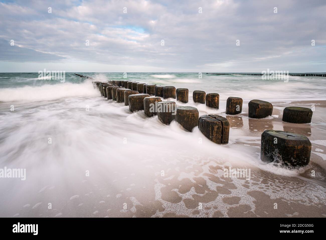 Groynes on shore of the Baltic Sea on a stormy day Stock Photo - Alamy