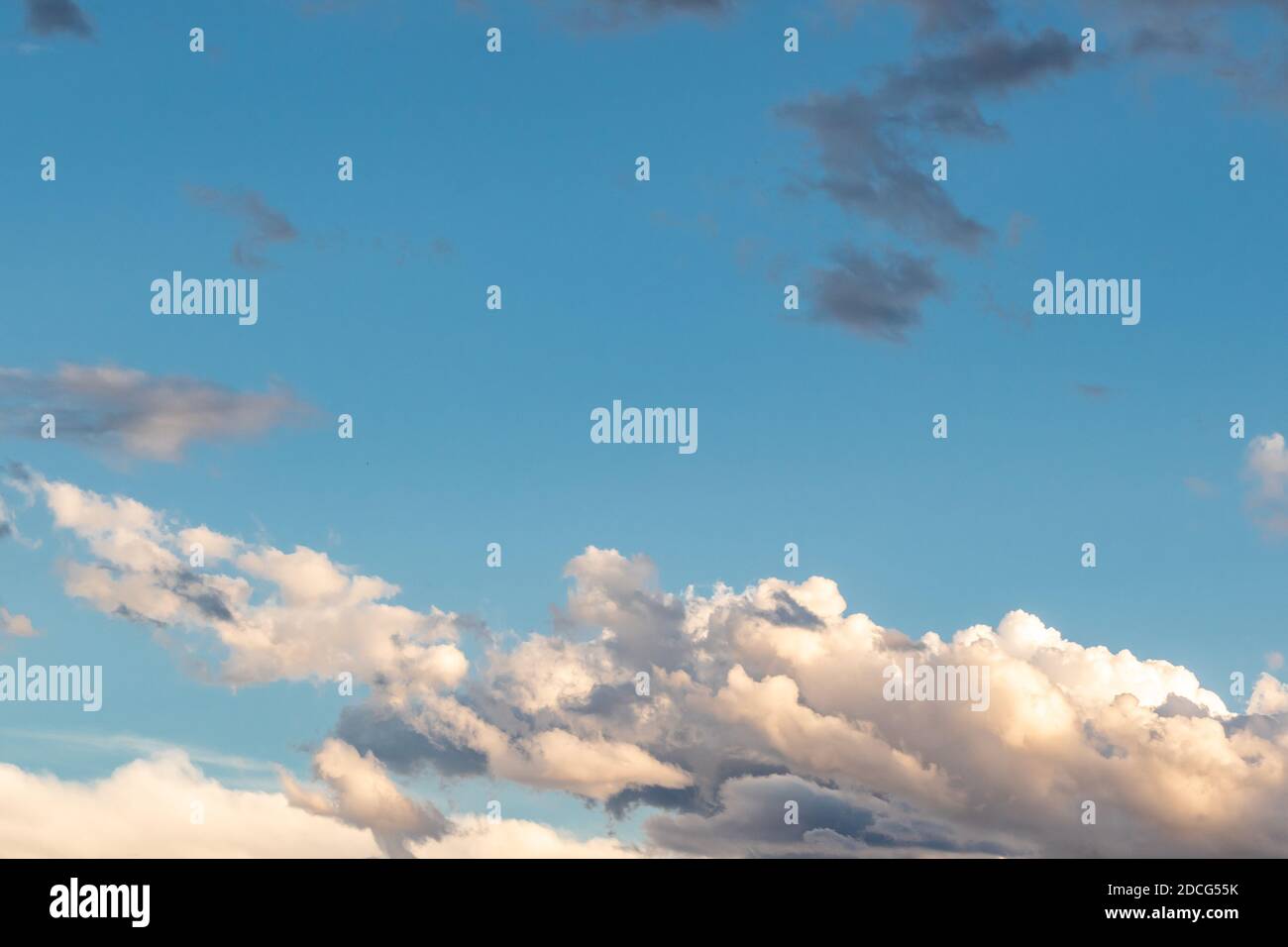 white clouds on a sunny day Stock Photo - Alamy