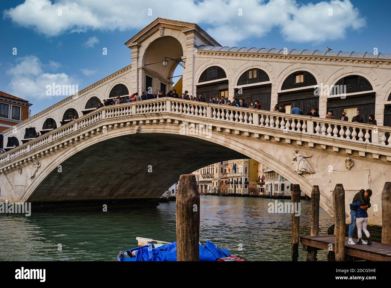 Venice, Veneto, Italy, Europe - October 16 2020: Rialto Bridge at COVID-19 time, with all the tourists wearing masks, Venice, Italy Stock Photo