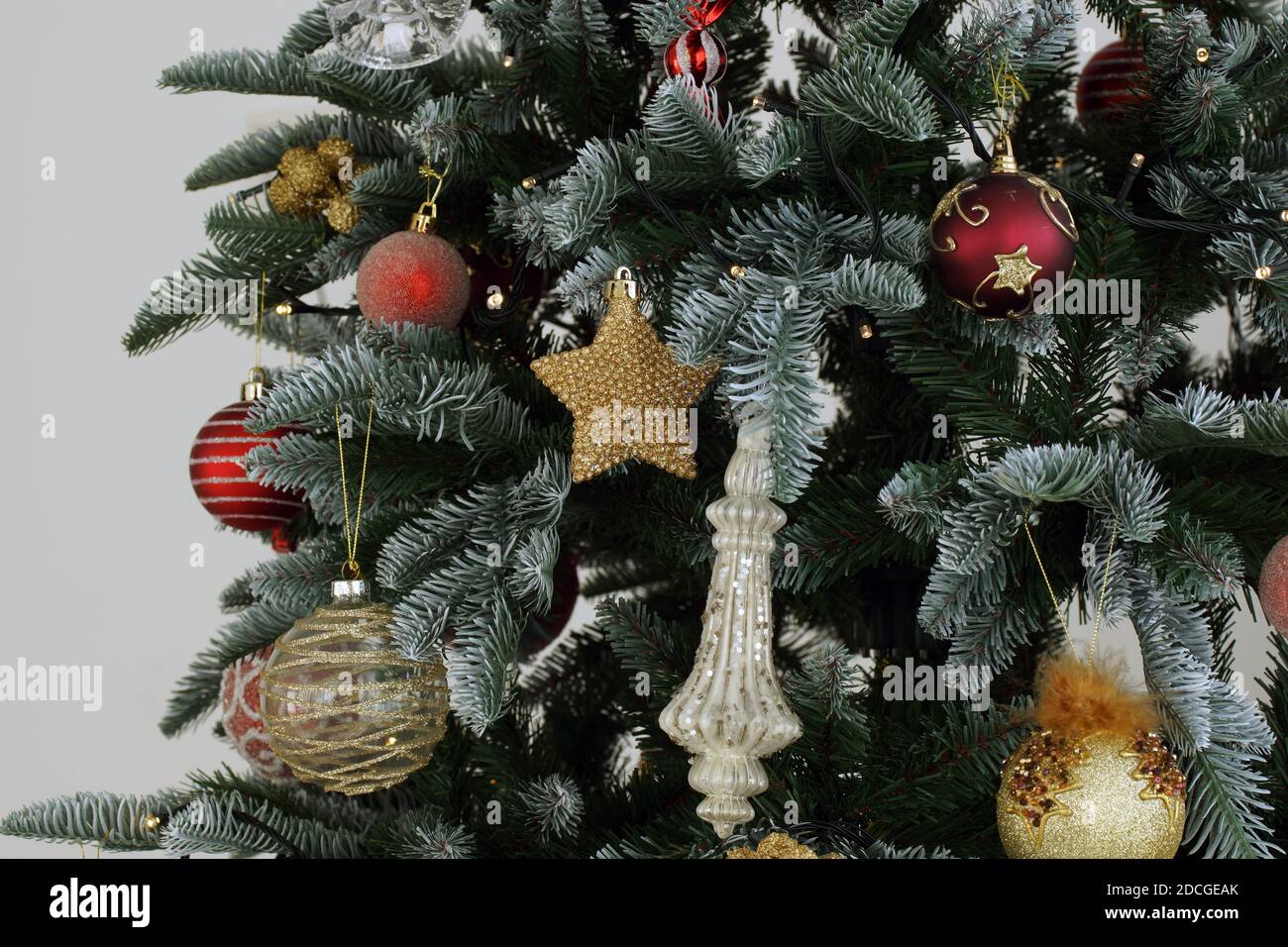 Red gold christmas tree decorations hires stock photography and images Alamy