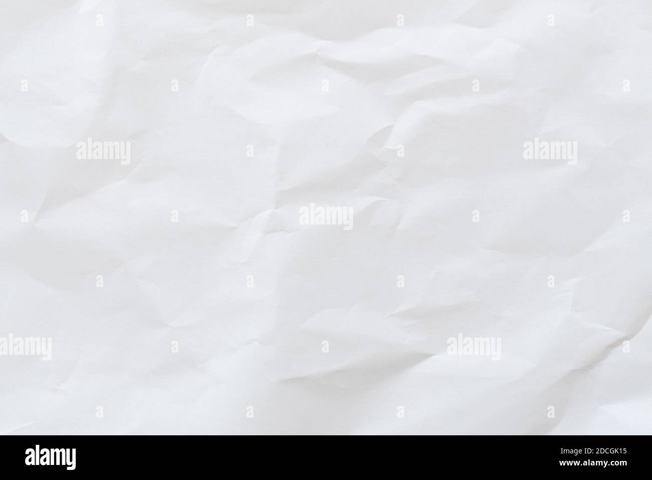 Crumpled white paper texture background, top view Stock Photo
