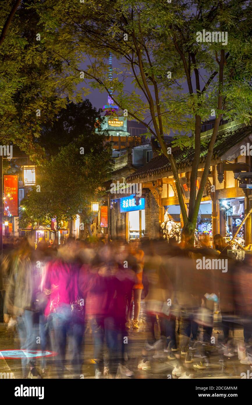 Shops and shoppers in Kuanxiangzi Alley at night, Chengdu, Sichuan Province, People's Republic of China, Asia Stock Photo