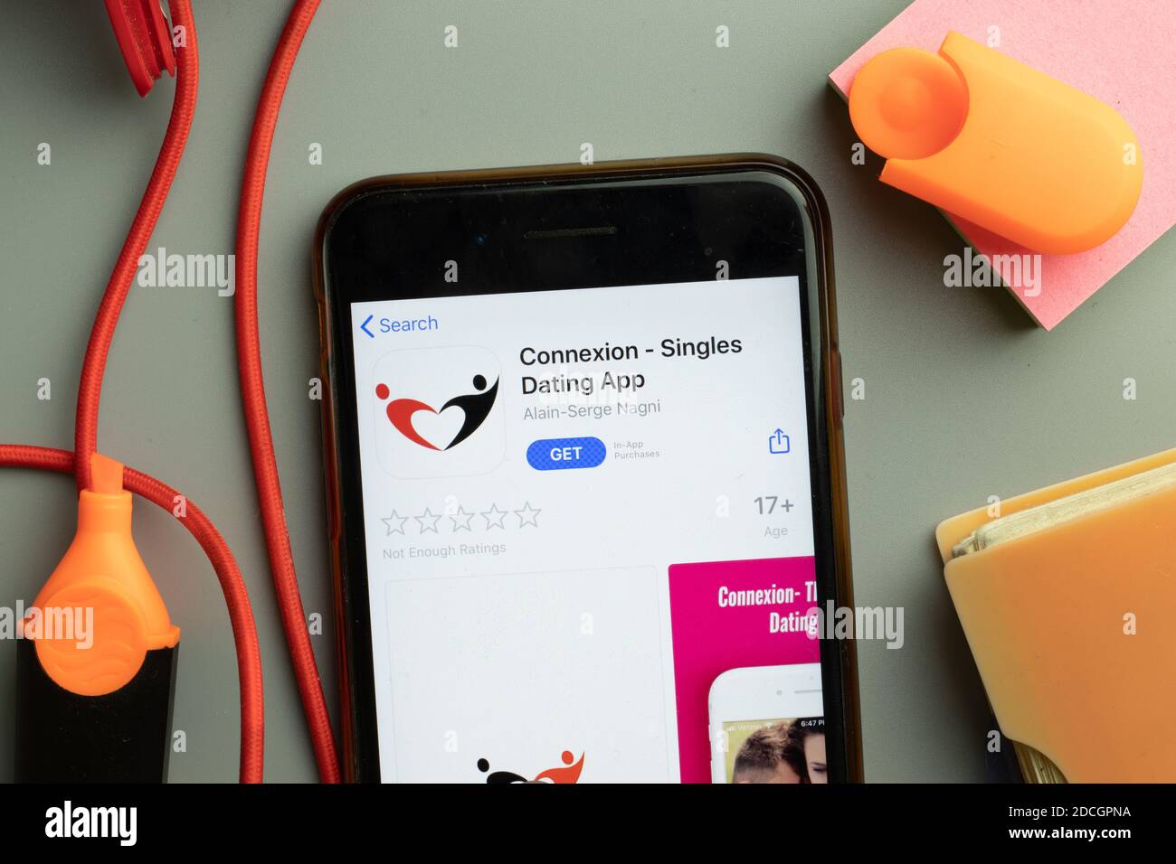 New York, United States - 7 November 2020: Phone screen close-up with Connexion Singles Dating mobile app logo on display, Illustrative Editorial. Stock Photo