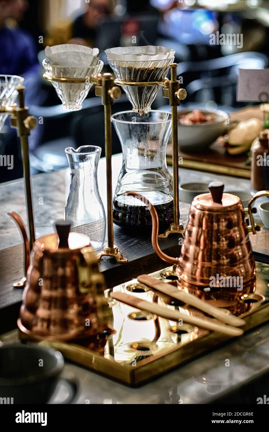 https://c8.alamy.com/comp/2DCGR6E/great-britain-england-london-coffee-style-brewing-equipment-copper-kettle-and-v60-coffee-dripper-to-make-filter-coffee-2DCGR6E.jpg