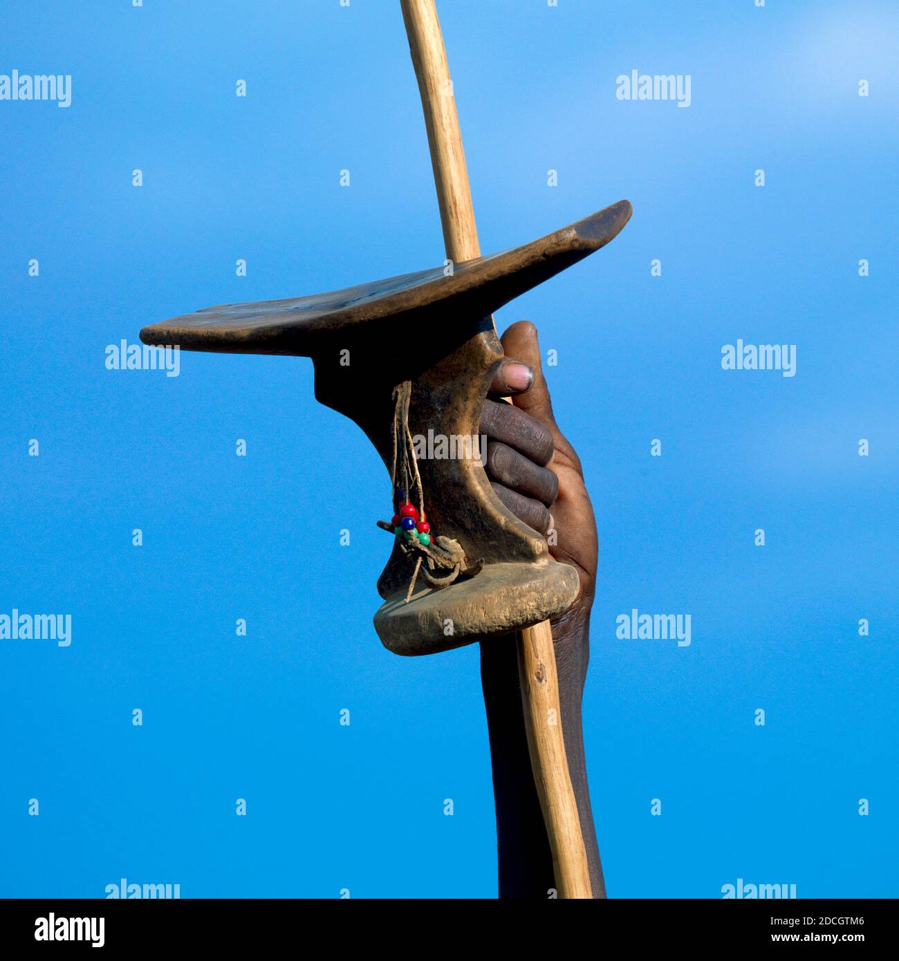 Pokot tribe man with a wooden headrest and a spear, Baringo County, Baringo, Kenya Stock Photo