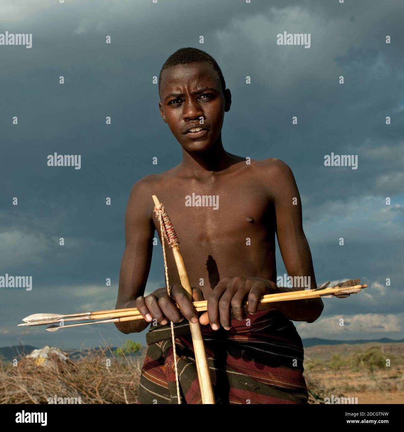 Portrait of a Pokot tribe man with a bow, Baringo County, Baringo, Kenya Stock Photo