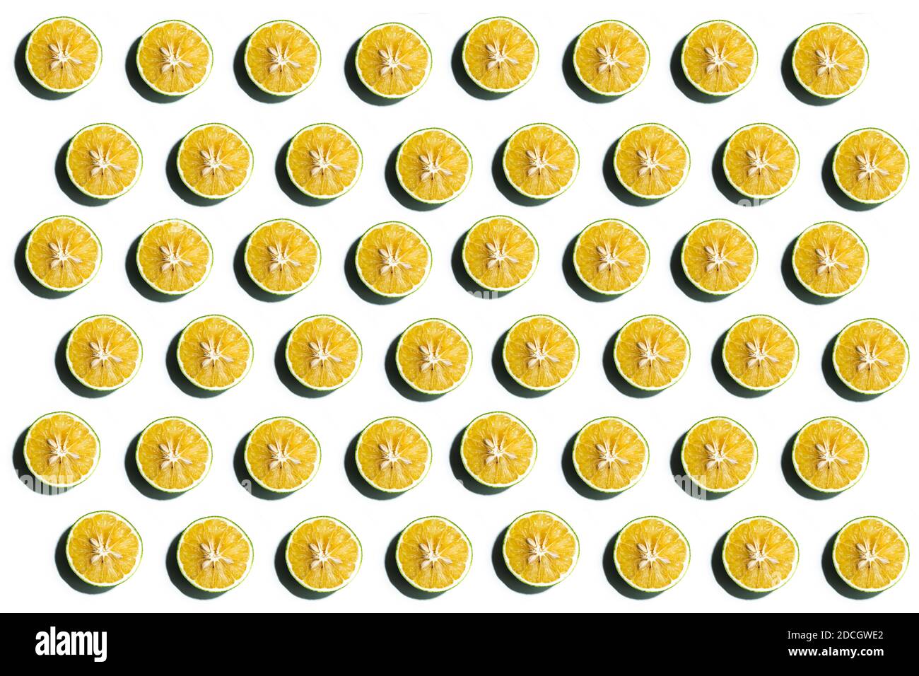 fresh lime slices pattern on white color background. Stock Photo