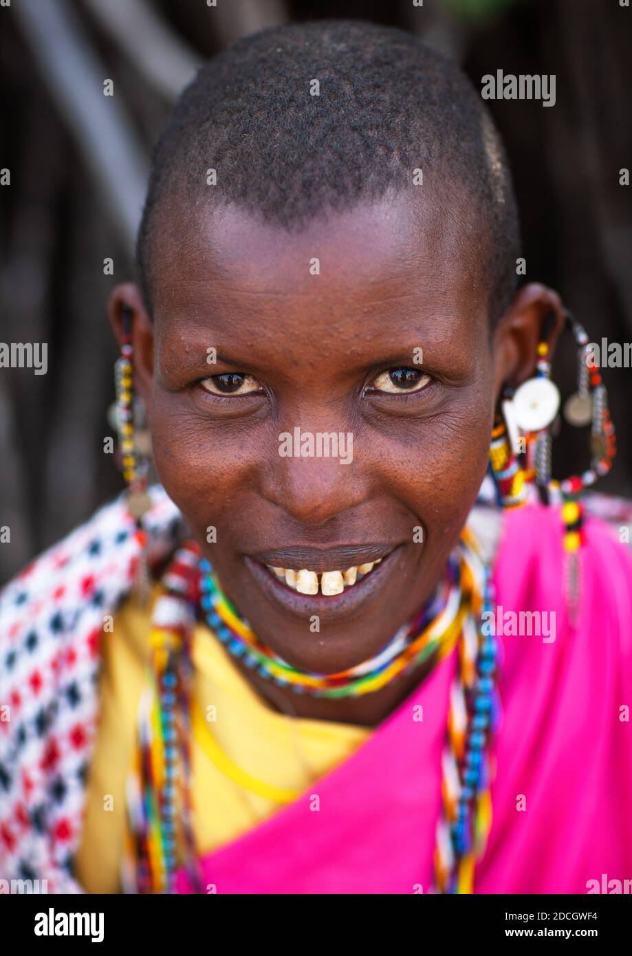 Portrait of a Maasai tribe woman with beaded earrings, Rift Valley Province, Maasai Mara, Kenya Stock Photo
