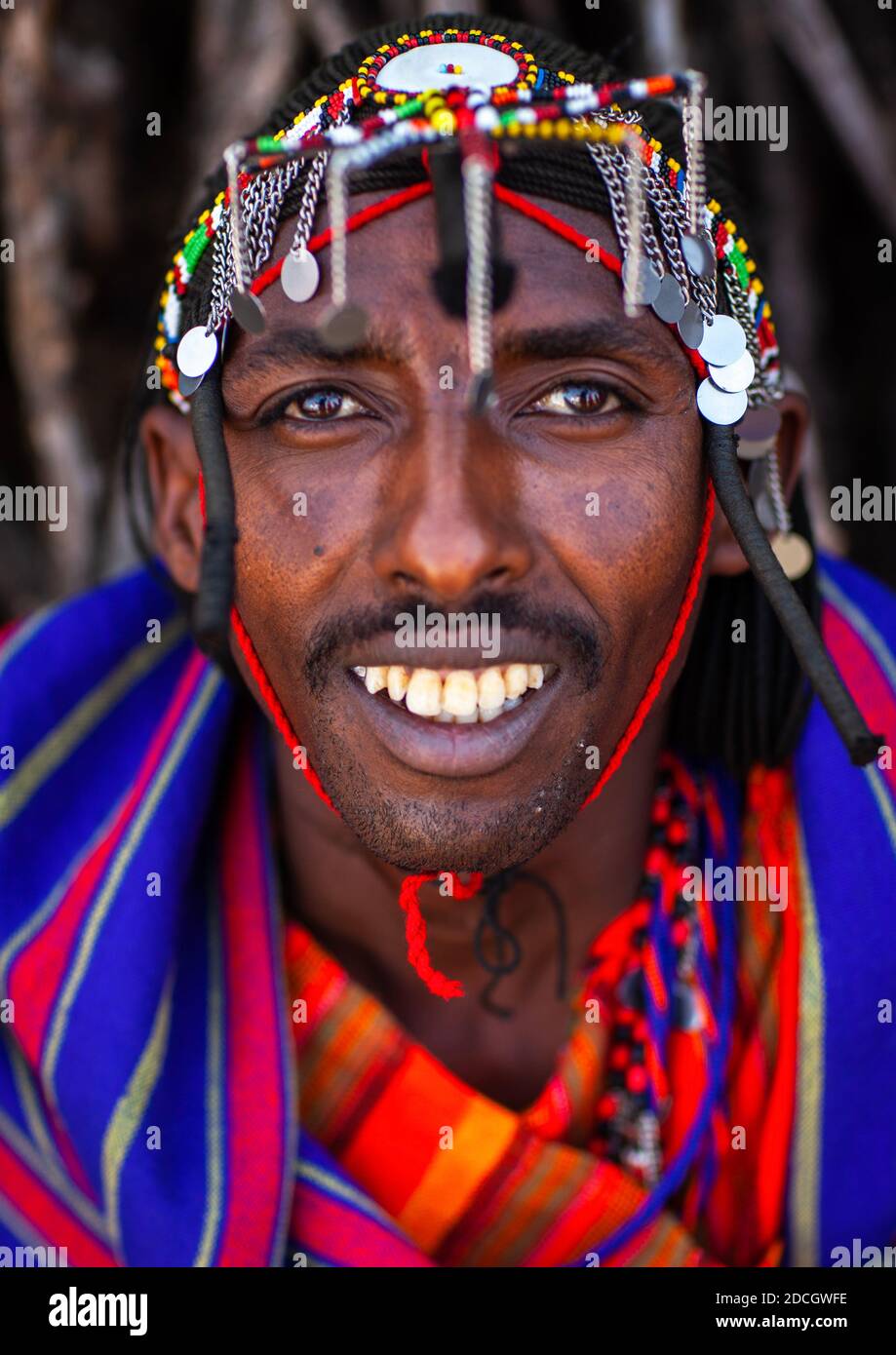 Portrait of a Maasai tribe man with a beaded headwear, Rift Valley Province, Maasai Mara, Kenya Stock Photo