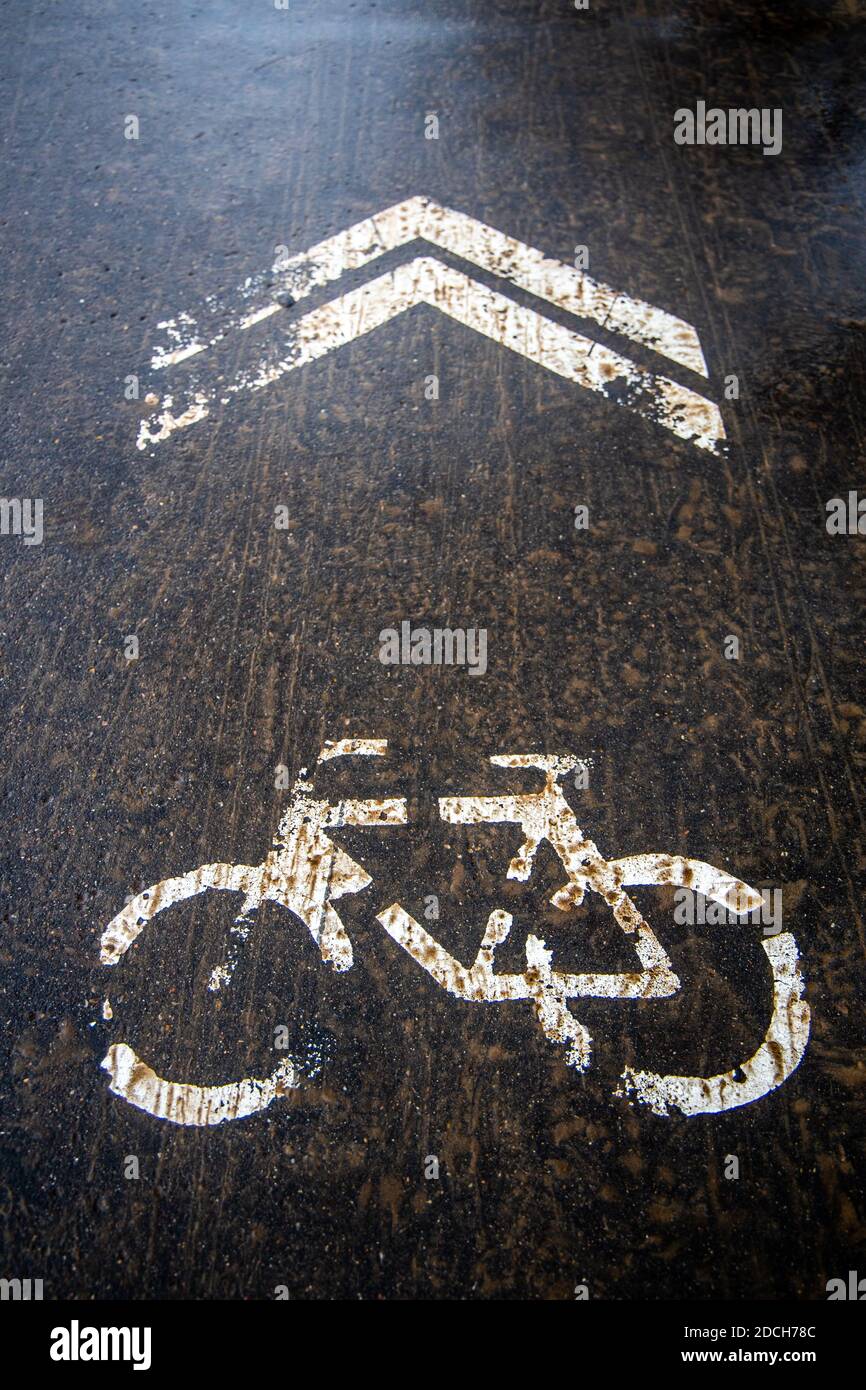 Bike sign on road in winter Stock Photo