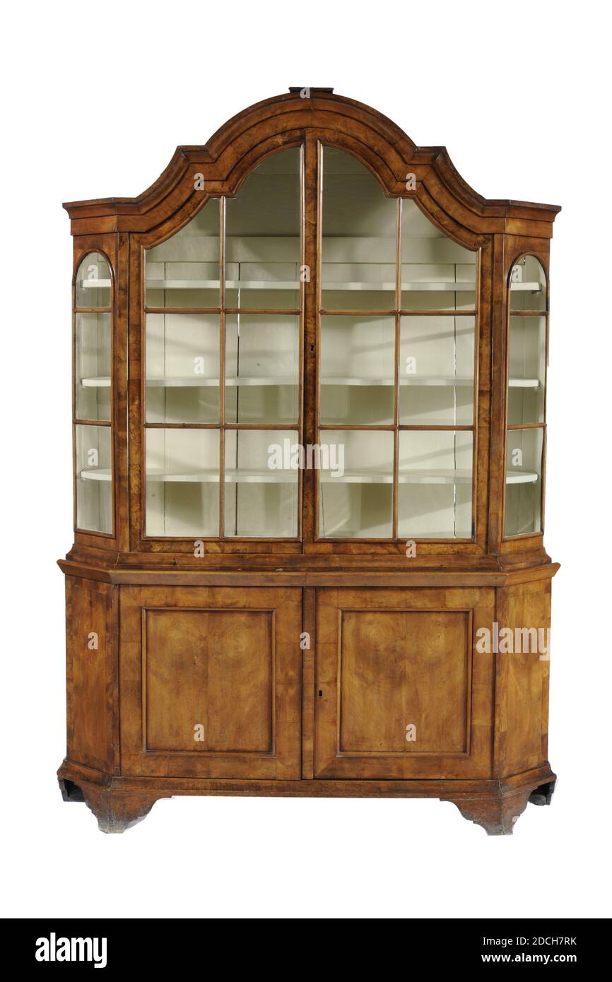 cupboard, Anonymous, 18th century, wood, metal, glass, walnut, glued, General: 227 x 160 x 35cm 2270 x 1600 x 350mm, Wooden glass and porcelain cupboard glued with walnut, with two glass doors, on a trapezoidal base, with four cut-out rear pedestals. The cabinet has a curved frame along the top edge. The top cabinet has two hinged glazed doors at the front, divided by wooden bars into rectangular windows. Both sides also contain glass, both with two horizontal bars. Inside the top part of the cabinet, three white-painted shelves are fitted. The base cabinet has two hinged wooden doors with Stock Photo