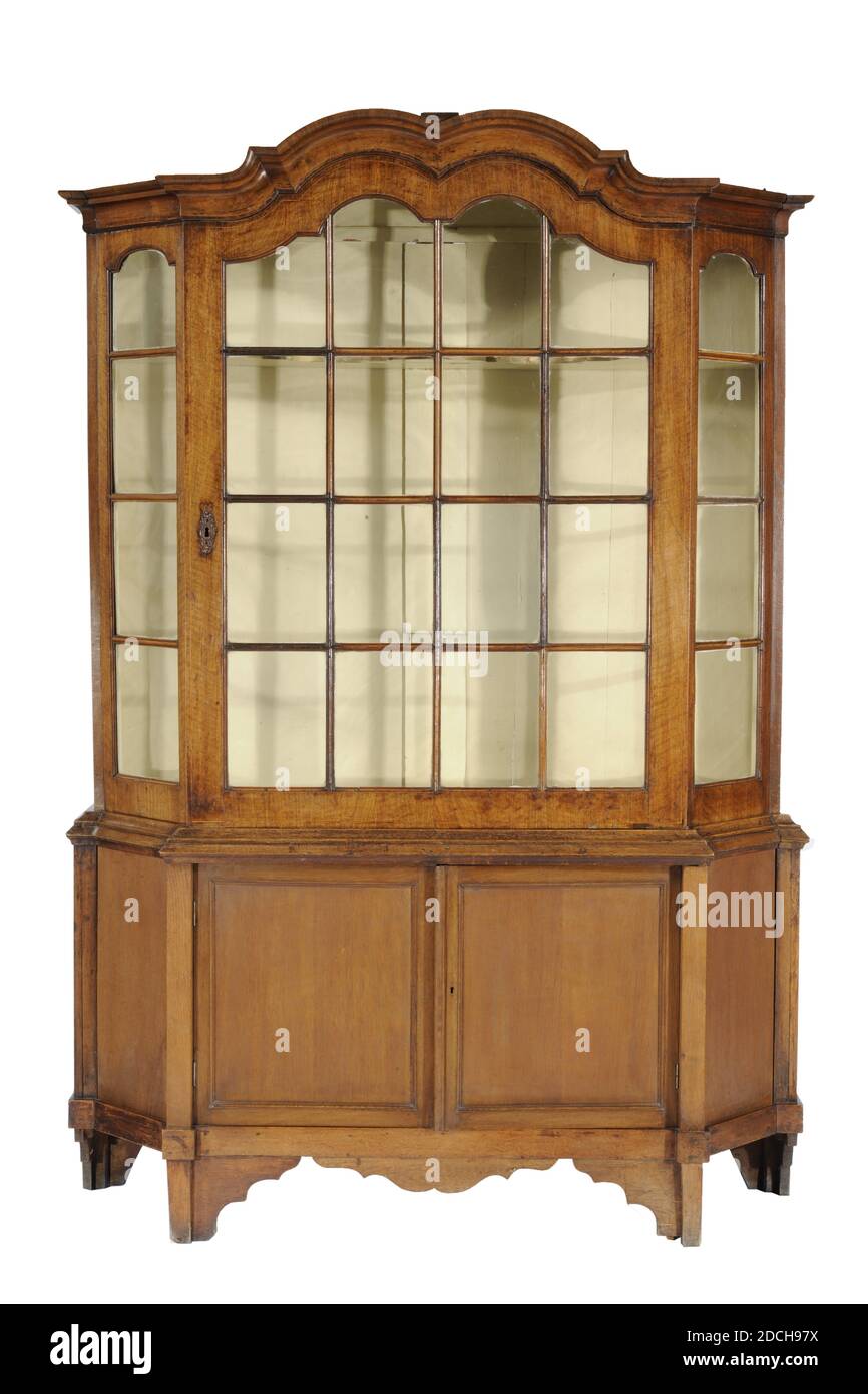 cabinet, Anonymous, ca. 1750, copper, wood, glass, General: 236 x 159.7 x 41cm 2360 x 1597 x 410mm, Wooden cabinet in two parts. The wall cabinet has one door with sixteen glass panes and a brass fitting on the left. The framework has profiled moldings. With a curved hood where the windows follow the curved line of the hood. The side wall is slanted with four panes and a narrow straight wall. The bottom rails are hollow profiled. Three shelves in the cupboard. The shelves and the inside of the cabinet are painted light yellow. The base cabinet has two doors with panels and a sloping wall. One Stock Photo