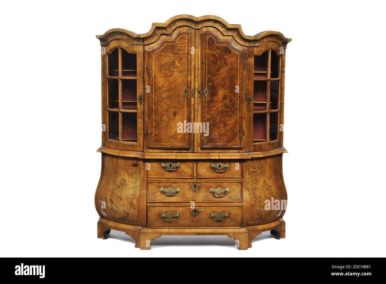 Anonymous, 18th century, glass, burr walnut, oak, brass, General: 69.6 x 61.7 x 19.4cm 696 x 617 x 194mm, Dutch miniature cabinet of oak veneered with burr walnut. The cabinet has curved corners and a curved top. In the frame two full and two half drawers with brass key fittings and two handles. The top frame has a double set of doors at the front, one set is closed and the second set is made of glass. Behind this three whole and a half boards, and three separate drawers. Under the two drawers on the corners is a secret drawer, which can be pulled out with a green ribbon. On both corners a Stock Photo