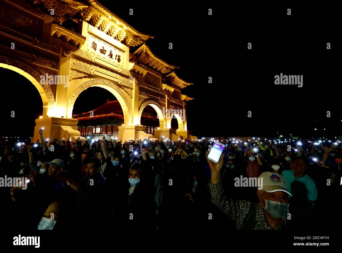 Protesters shine their phone lights during the demonstration.Protest against the revoking of the operation license for CTi News, a pro Kuomintang (KMT) television company, by the National Communication Commission, in Taipei City. Stock Photo