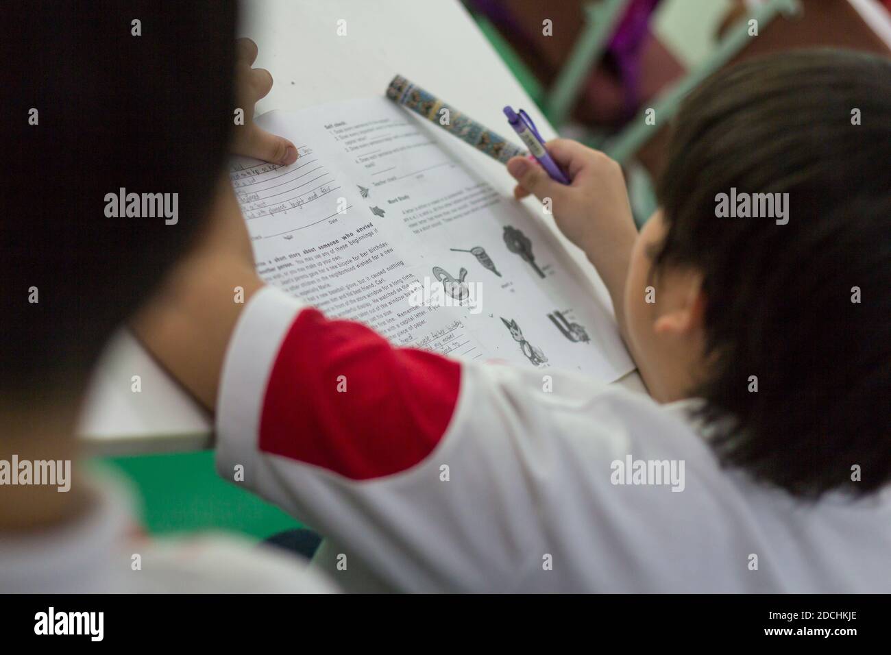 School children during their studies. Stock Photo