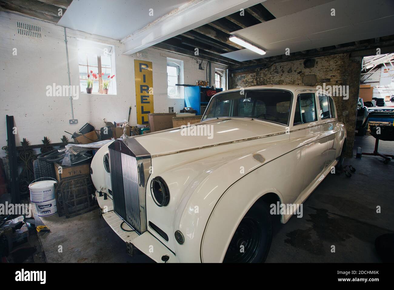 rolls royce car partly taken apart/stripped down for restoration in a domestic garage/workshop. Stock Photo