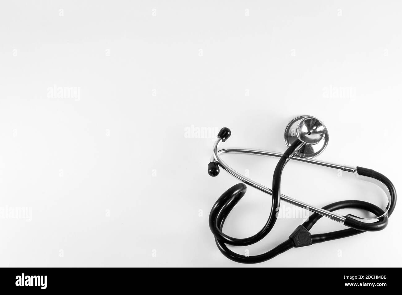 Isolated stethoscope phonendoscope on white background. Device for listening to the lungs and heartbeat. Medical instruments, top view, copy space. Stock Photo