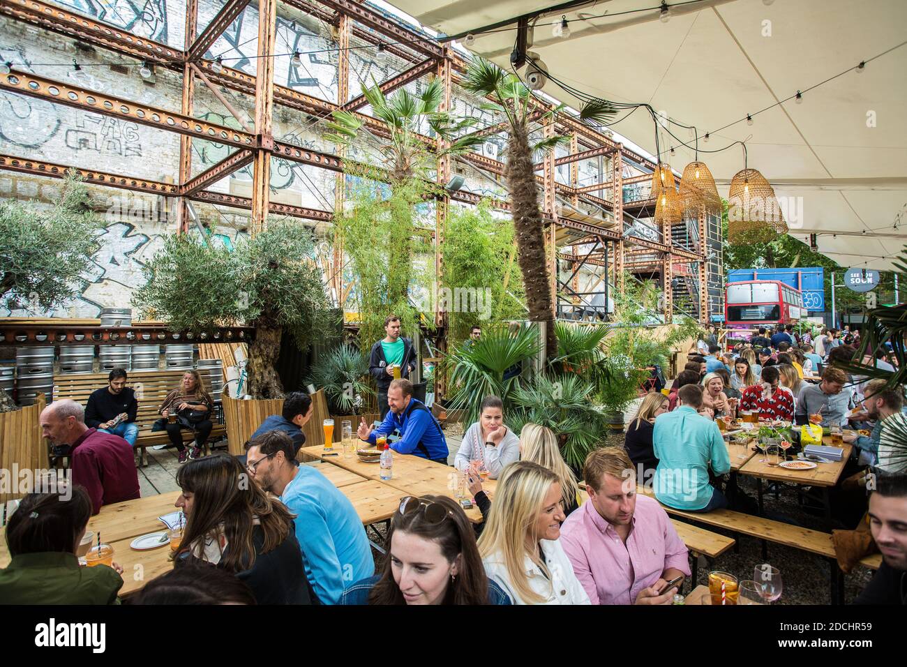 Trendy Mercato Metropolitano, in a disused paper factory, and part of the Elephant & Castle's regeneration project, in SE London, UK Stock Photo