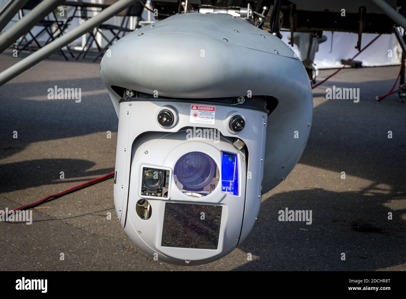Multi-Sensor surveillance pod under an airplane. Stock Photo