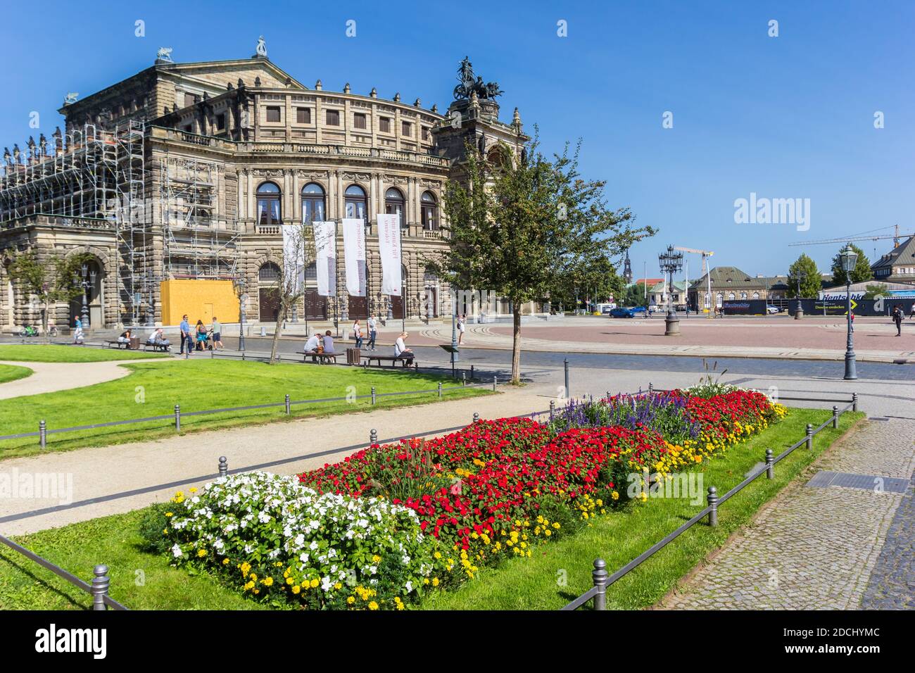 Flowers in front of the historic opera building in Dresden, Germany