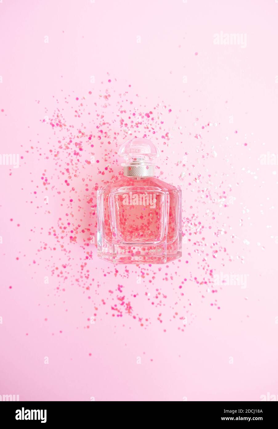 Perfume On Glitter Pink Pastel Background Flat Stock Photo Alamy
