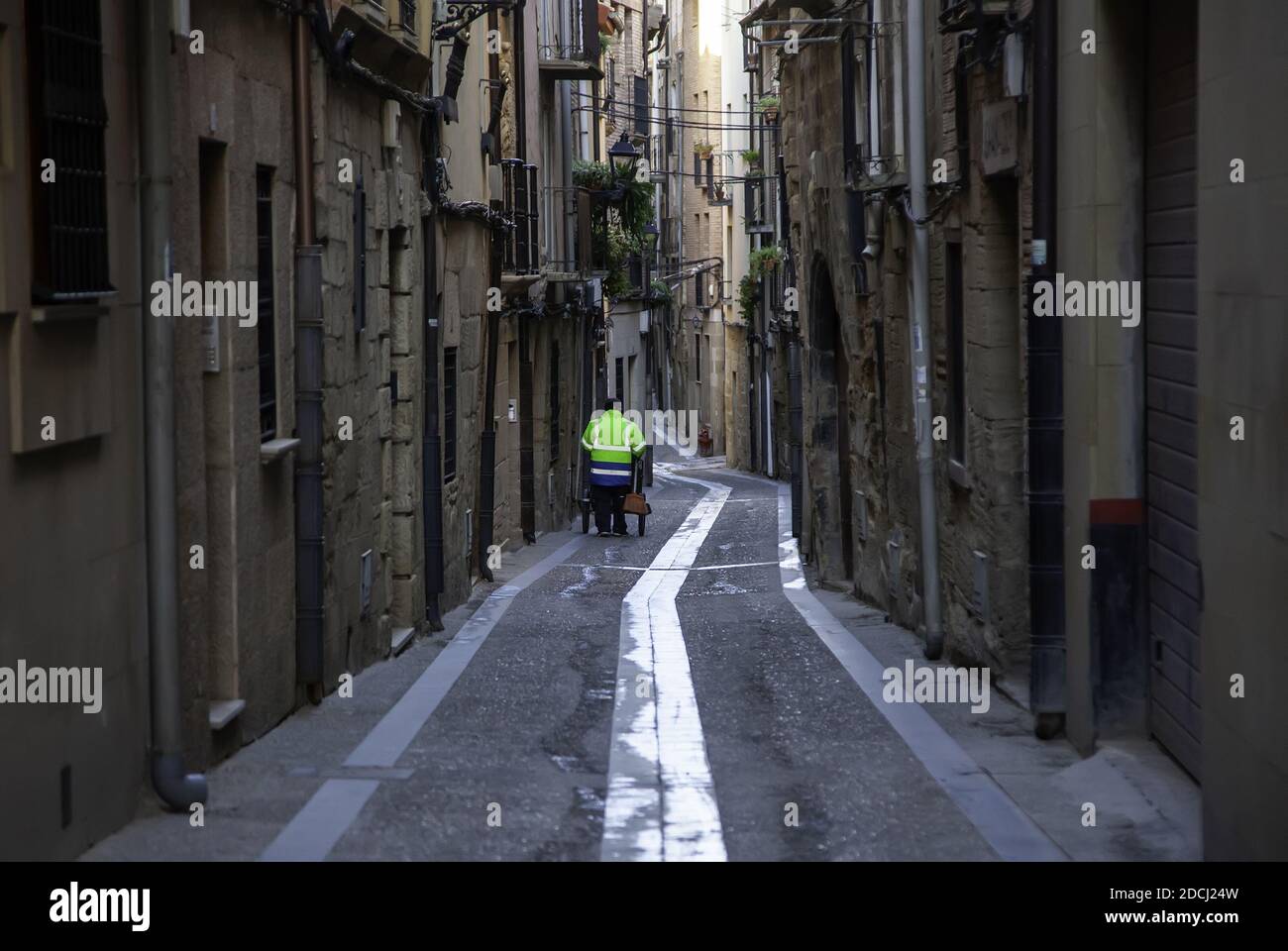 Street sweeper working, cleaning and disinfecting the city Stock Photo