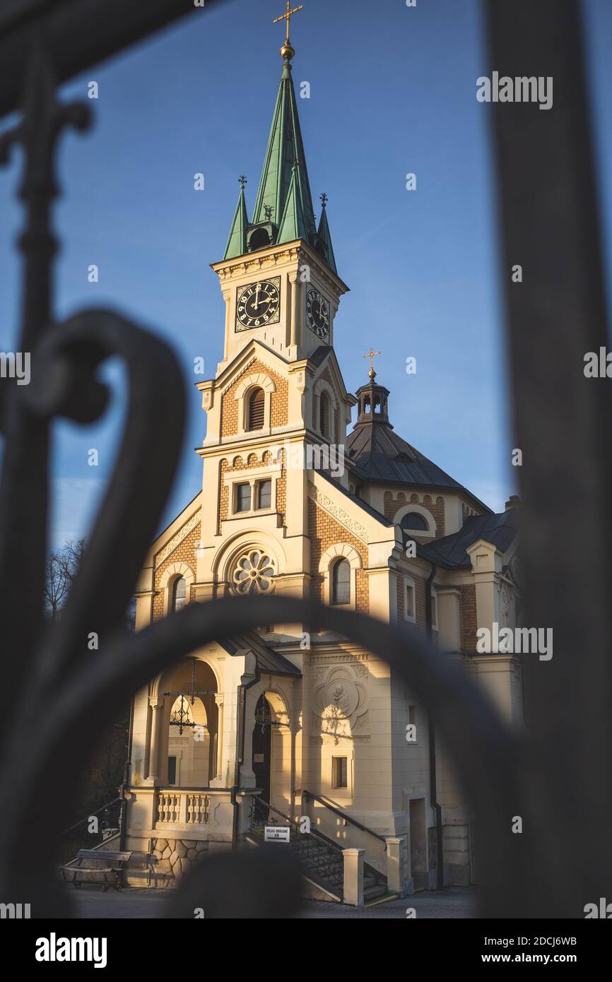 Czech Republic, 11/21/2020: Cemetery church photographed behind the cemetery gate Stock Photo