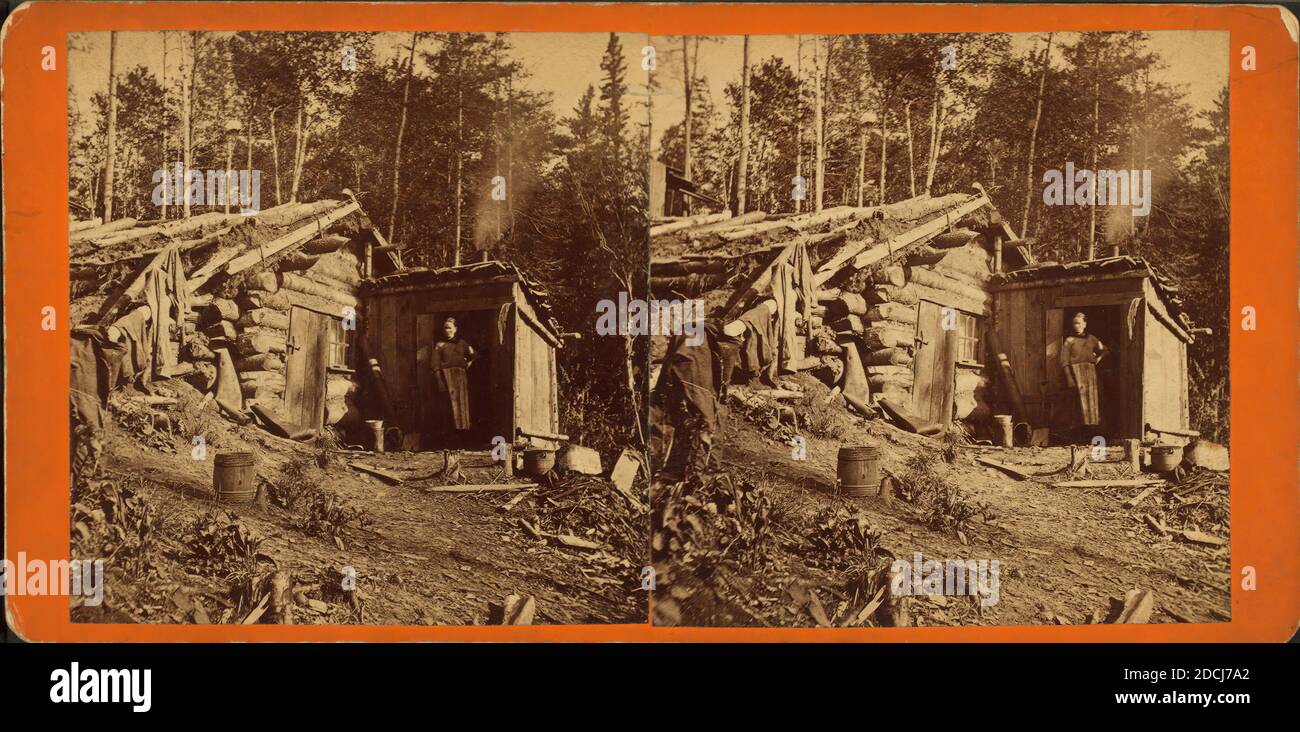Woman stands in doorway of log cabin on the Northern Pacific Road., still image, Stereographs, Childs, B. F. (Brainard F.) (ca. 1841-1921 Stock Photo