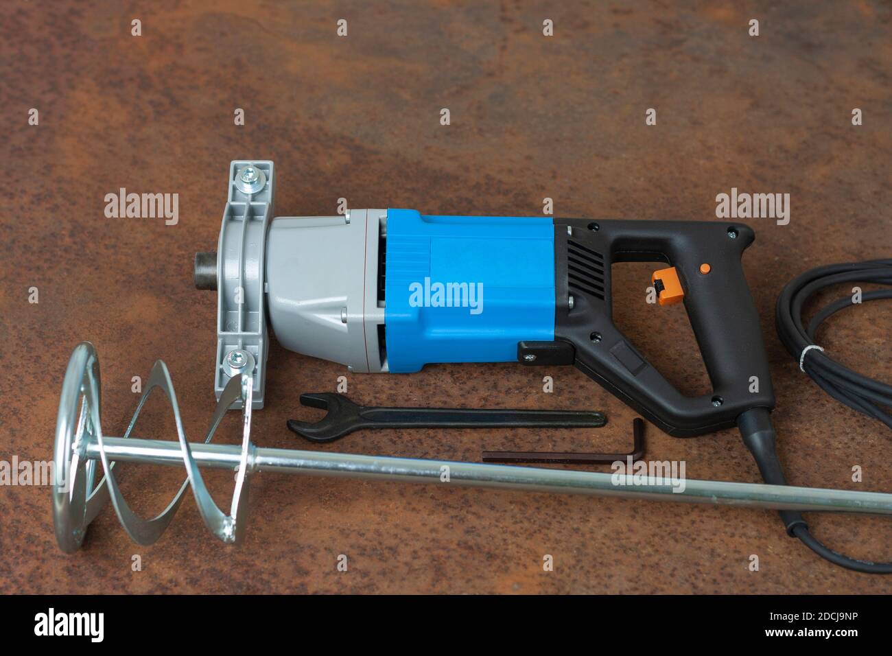 Wrench, spiral paddle mixer and mixing drill for mixing of mortar, paint , plaster and powder on