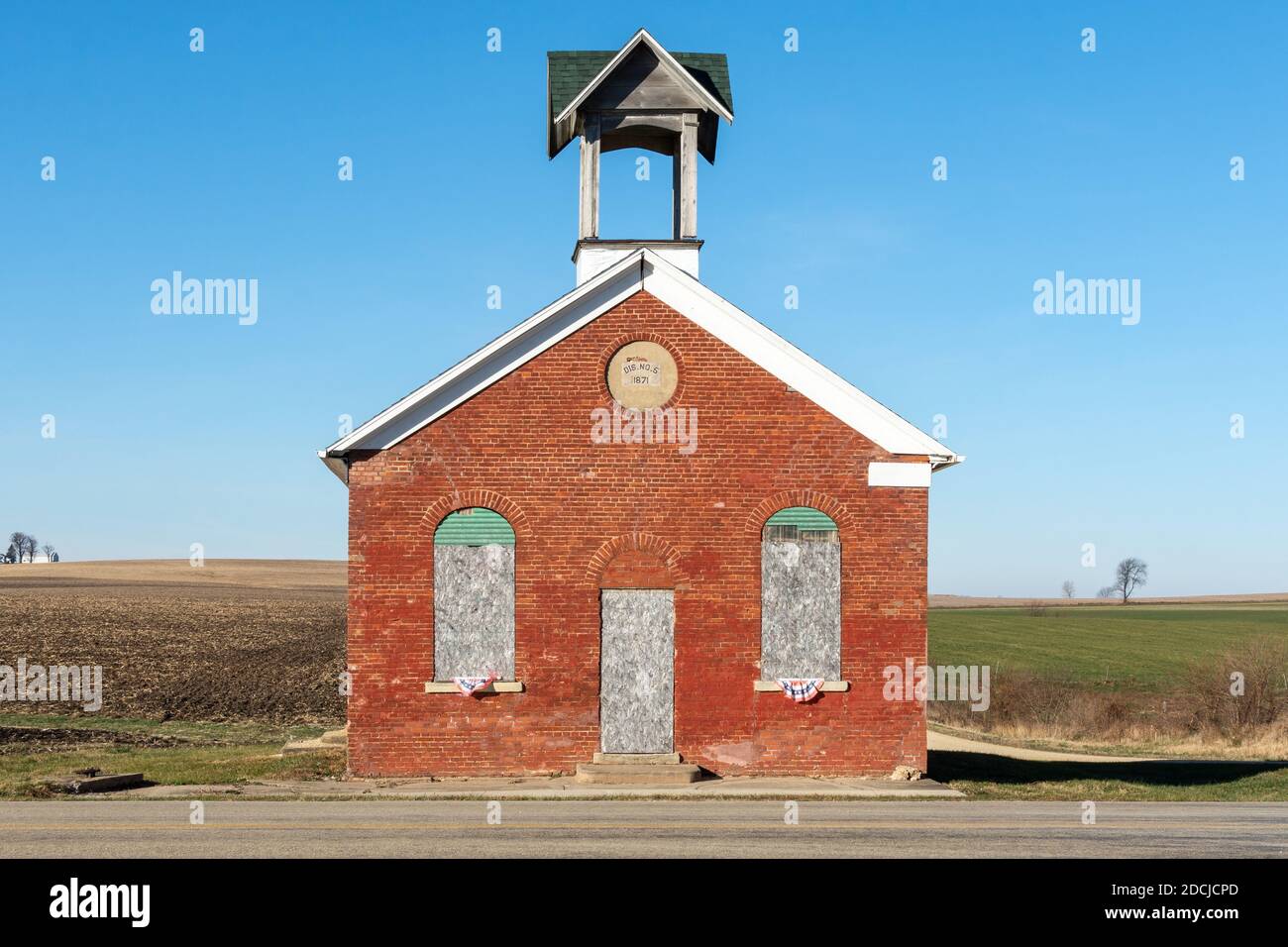 Old one room schoolhouse with farm fields behind. German Valley, Illinois. Stock Photo
