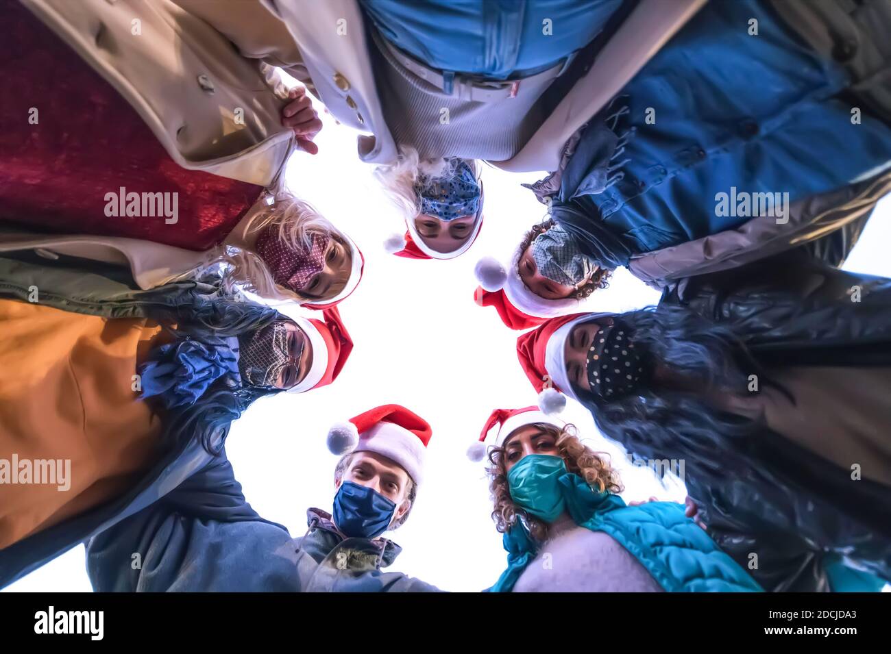 Merry Christmas and Happy New Year! Multiracial friends taking selfie ...