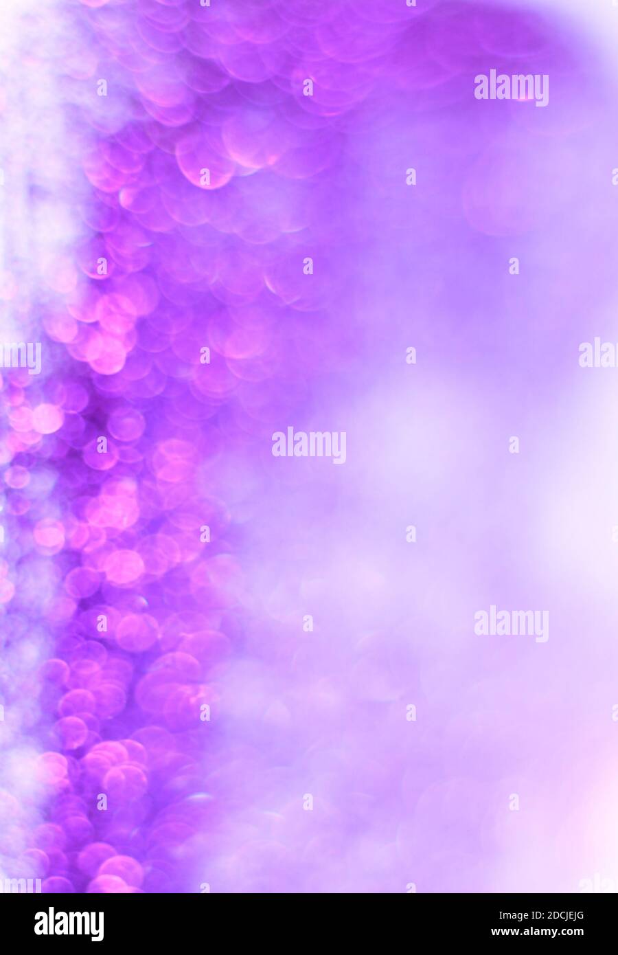 A closeup shot of beautiful purple sprinkles for wallpaper or background Stock Photo