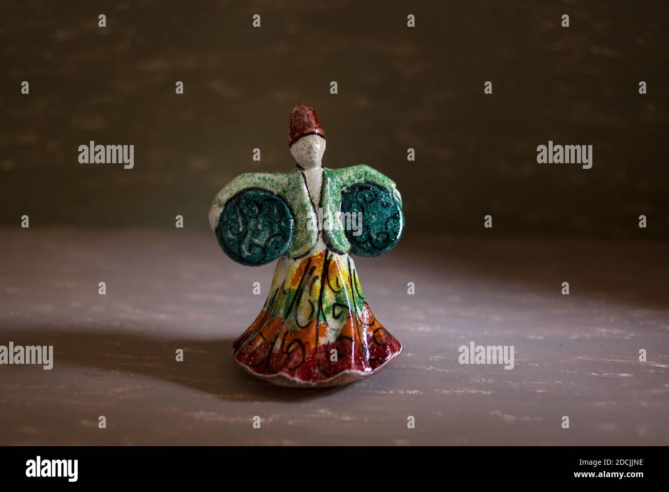 Cairo, November 10. traditional   handmade pottery statue of dancing dervish (a member of a Muslim (specifically Sufi) religious order) with colorful Stock Photo