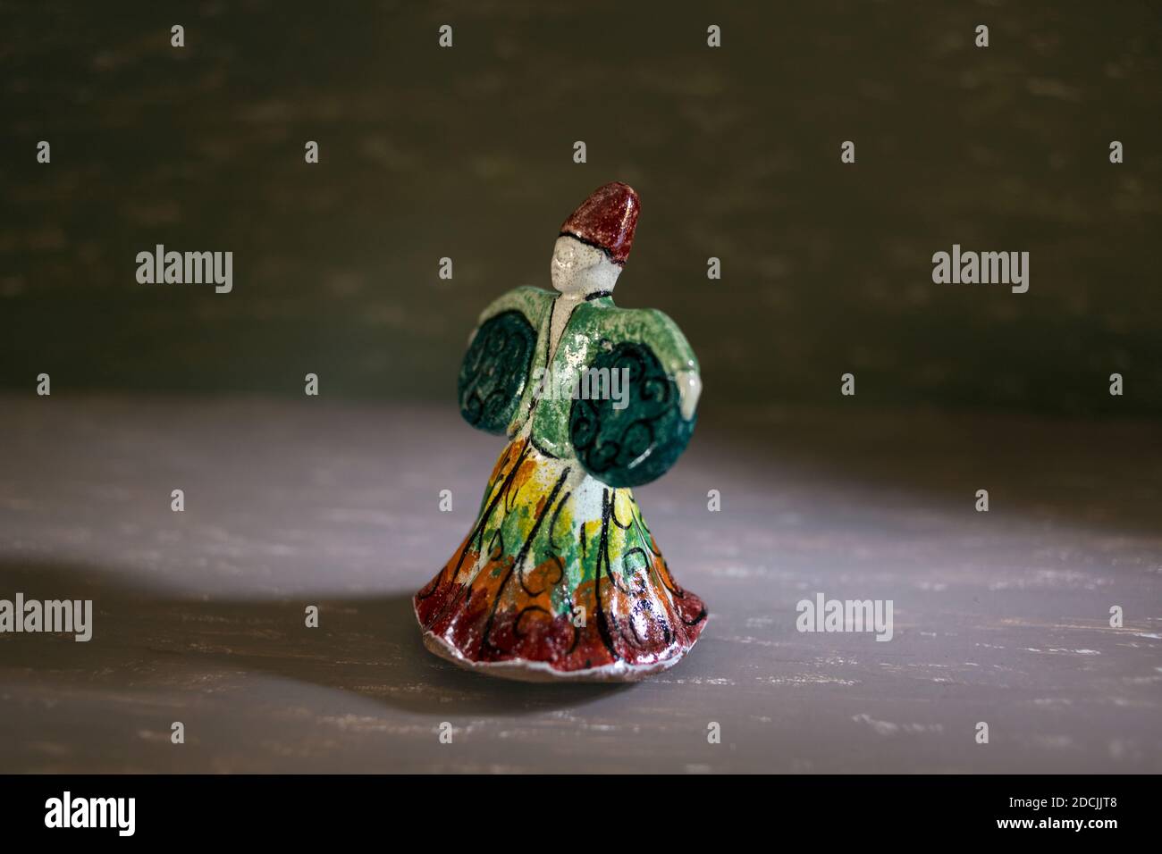 Cairo, November 10. traditional   handmade pottery statue of dancing dervish (a member of a Muslim (specifically Sufi) religious order) with colorful Stock Photo