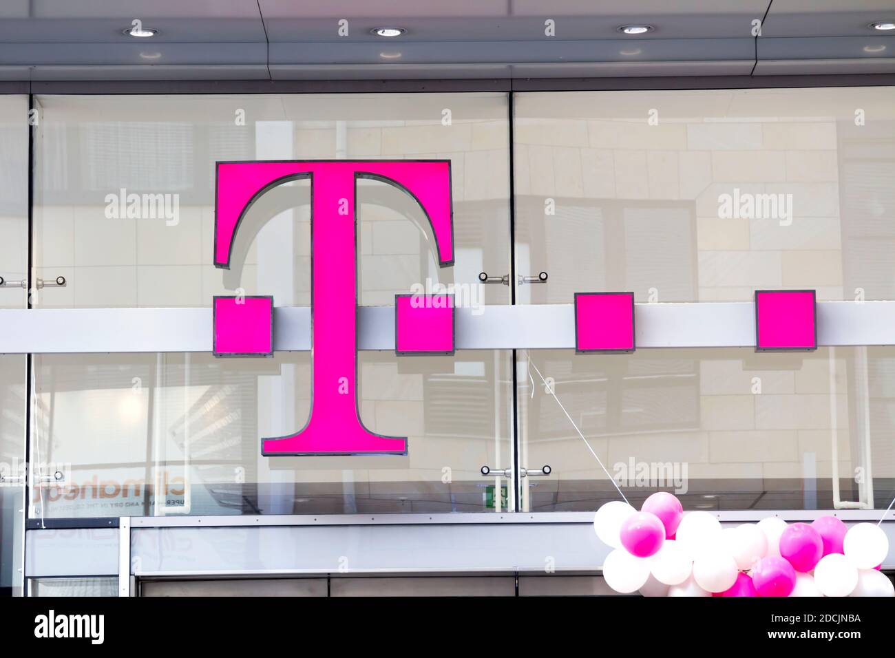 Emblem T-Mobile. T-Mobile International AG is a holding company for Deutsche Telekom AG's various mobile communications subsidiaries outside Germany Stock Photo