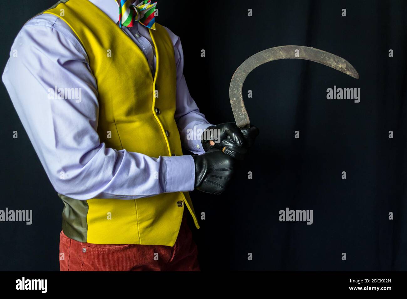 Portrait of Man in Bright Yellow Waistcoat and Leather Gloves Holding