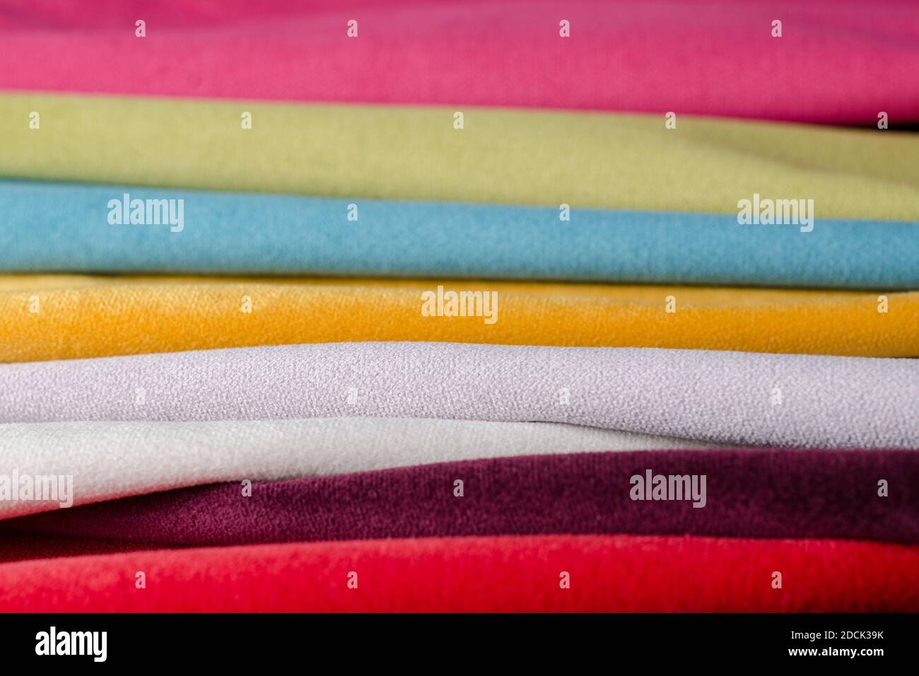 Bright collection of colorful velour textile samples. Fabric texture background Stock Photo