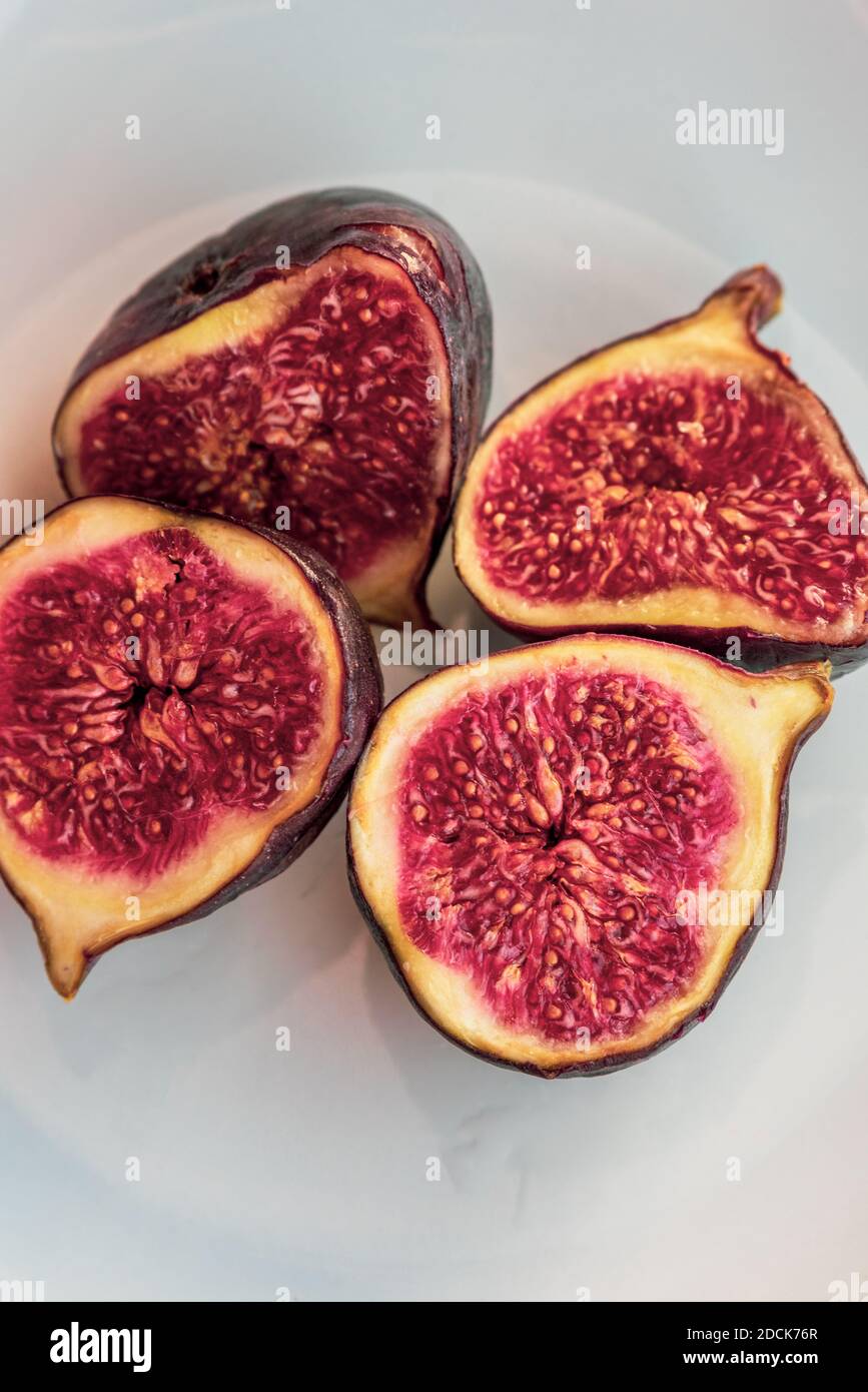 figs. Collection of whole and sliced fresh fig fruits. Fig chunks on