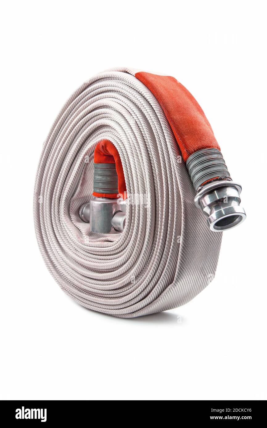 Red fire hose coil isolated on the white background. Stock Photo