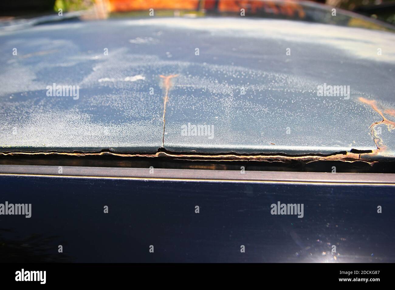 The consequences of poorquality car body repair. The putty is peeling