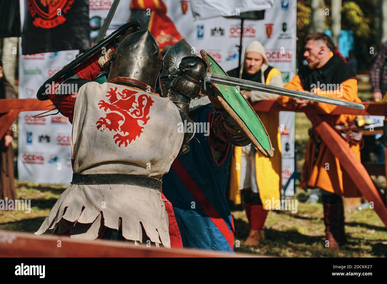 Reconstruction of medieval jousting tournaments. Knights in armor and