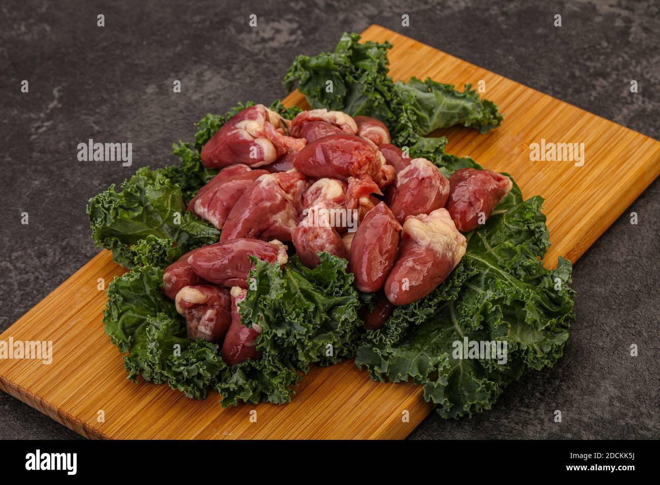 Raw chicken hearts heap for cooking Stock Photo Alamy