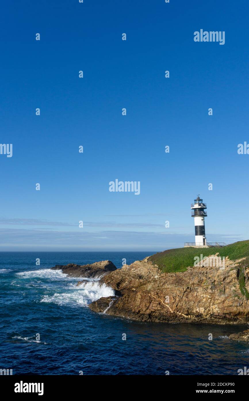 A view of the lighthouse on Isla Pancha in Galicia Stock Photo - Alamy