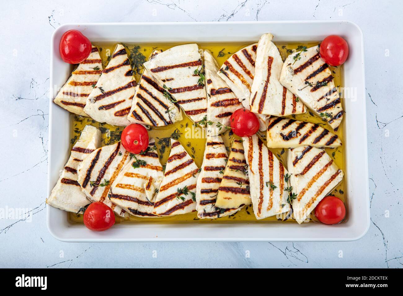 Turkish cuisine appetizers; Fried Halloumi cheese in the grill pan Stock Photo Alamy