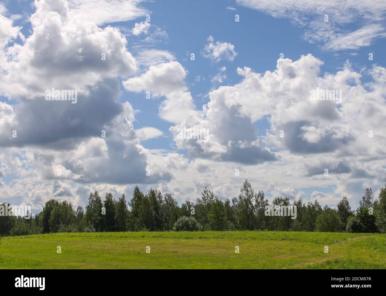 Blue sky background with white fluffy clouds in warm summer day Stock ...