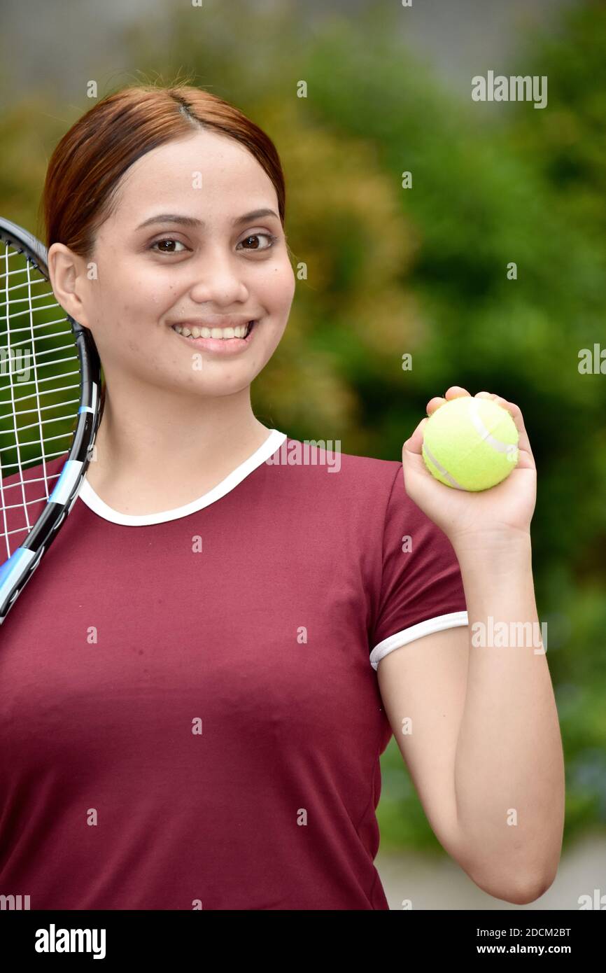 A With Tennis Racket Outside Stock Photo - Alamy