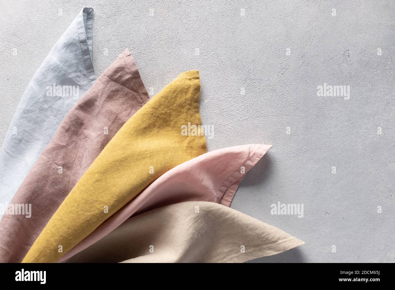 neutral colored linen cloth napkins. crafts kitchen textile background Stock Photo