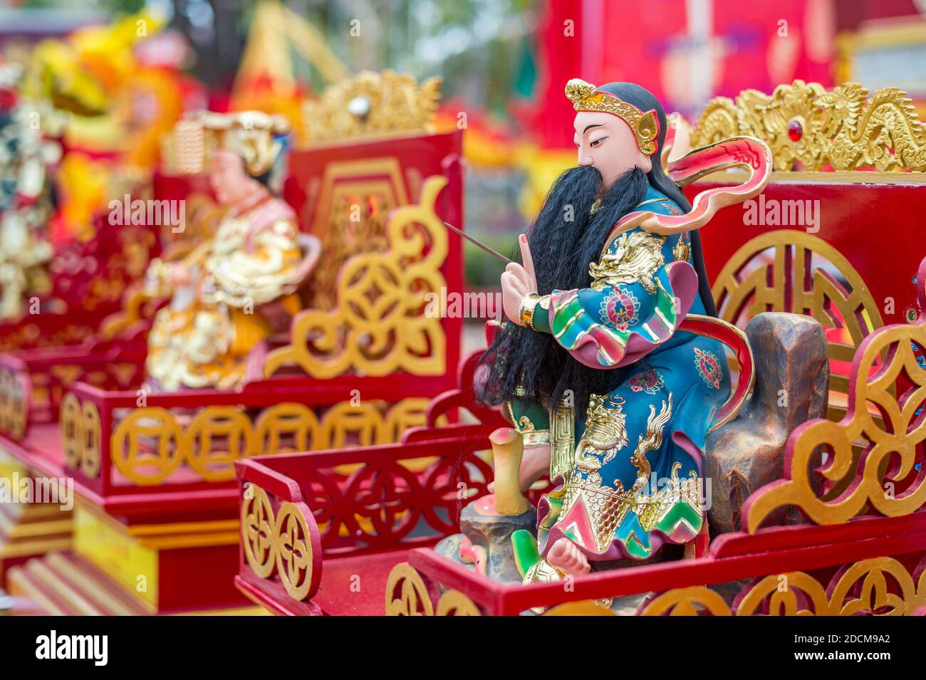 Buddhist artifacts displayed during celebration of the Chinese New Year in Hua Hin, Thailand Stock Photo