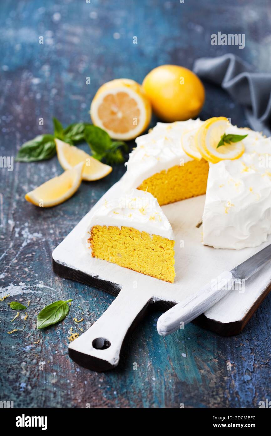 Lemon almond gluten free cake with cream cheese frosting, selective focus Stock Photo